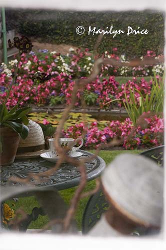 Ready for a tea break after gardening, Garden House of private garden, Butchart Gardens, Victoria, BC